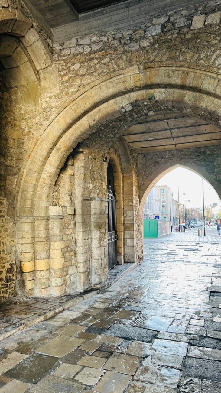 Close-up of Bargate stonework and clock above the main arch in Southampton