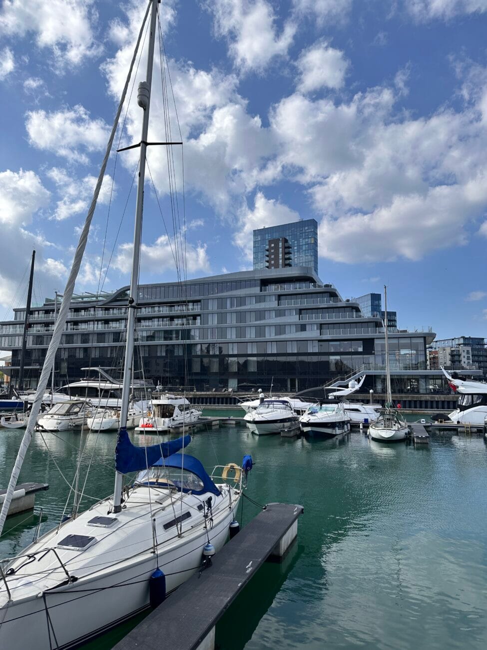 Sailboats in Ocean Village marina with Harbour Hotel in the Background