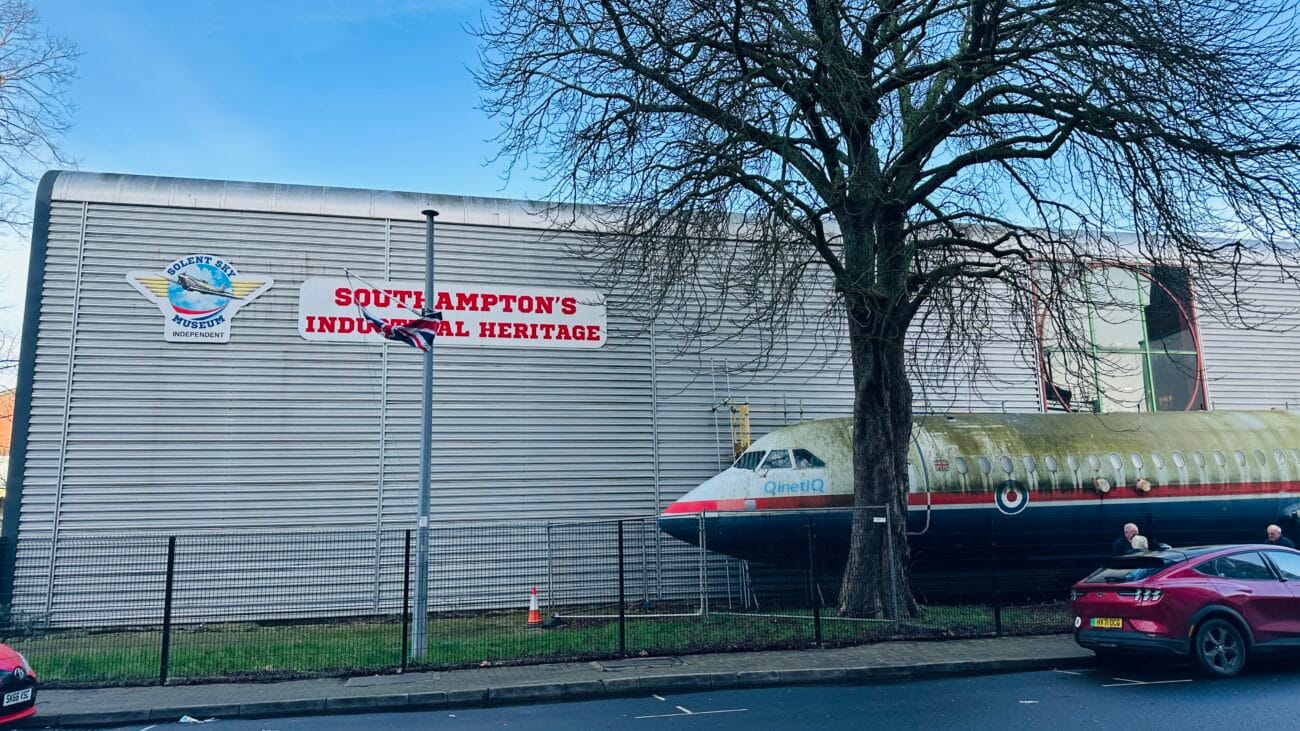 Side view of the Solent Sky Museum featuring aviation signage.