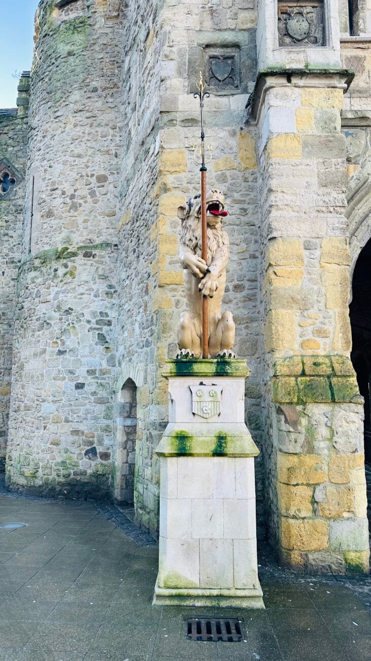 Stone lion by The Bargate landmark on Southampton High Street